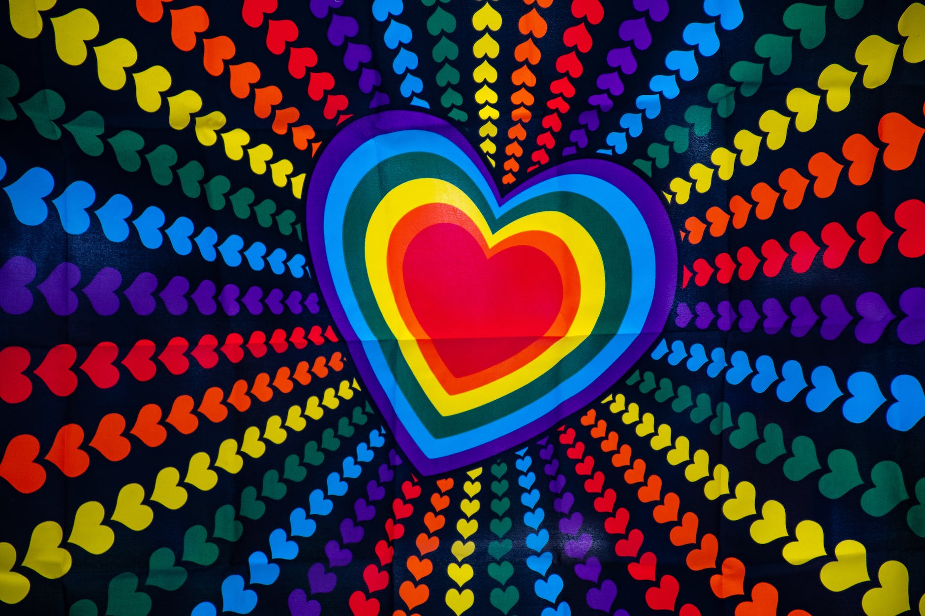 blue purple red and yellow heart printed poster